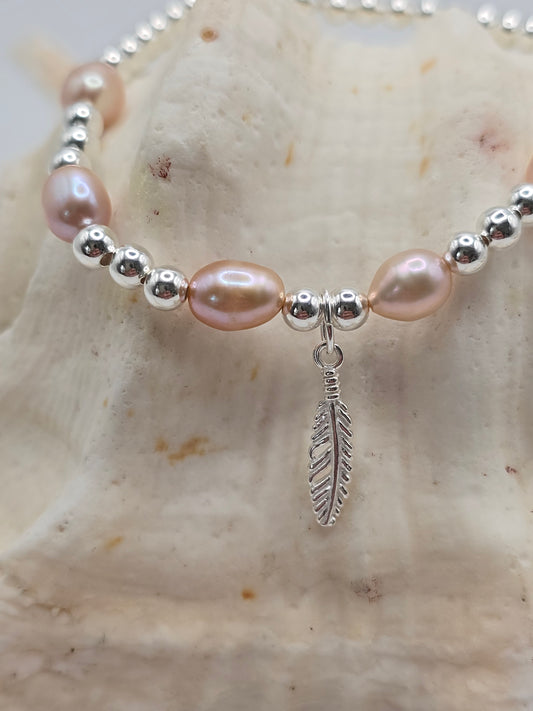 Sterling Silver Stretch Bracelet with Cultured Freshwater Pearls and Sterling Silver Feather