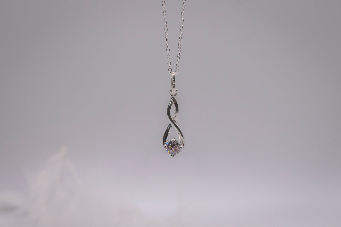 Sterling Silver Entwined Pendant with Cubic Zirconia on an 18 inch Sterling Silver chain